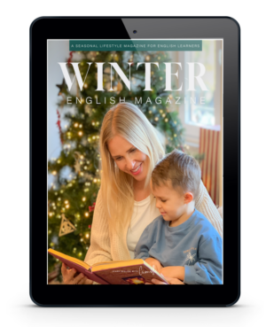 A person and child read together in front of a decorated Christmas tree on a tablet displaying a magazine cover titled "Winter English Magazine."