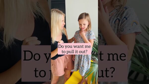 A person and child stand indoors, with pastel text overlay: "Do you want me to pull it out?" A plant is nearby.