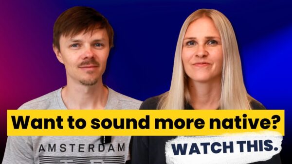 Two people smiling with a vibrant blue and pink background. Text reads, "Want to sound more native? WATCH THIS." Person wears "Amsterdam" shirt.