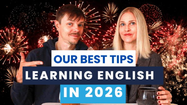 Two people smiling with fireworks in the background. Text overlay: "Our Best Tips Learning English in 2026."