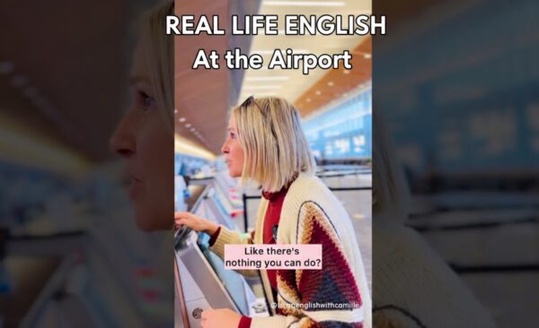 A person at an airport counter, text reading "REAL LIFE ENGLISH at the airport" and "Like there's nothing you can do?"